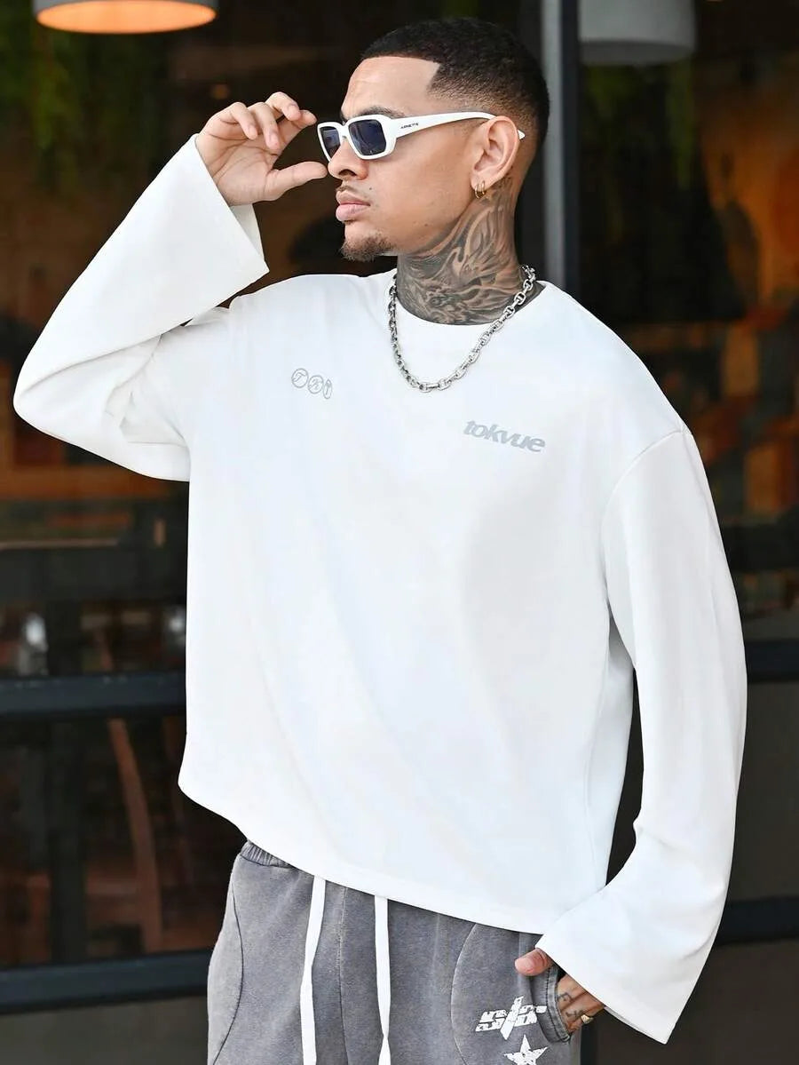 Oversized longsleeve met graphic slogan