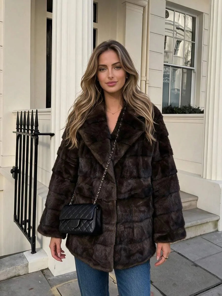 Faux fur jas met zakken
