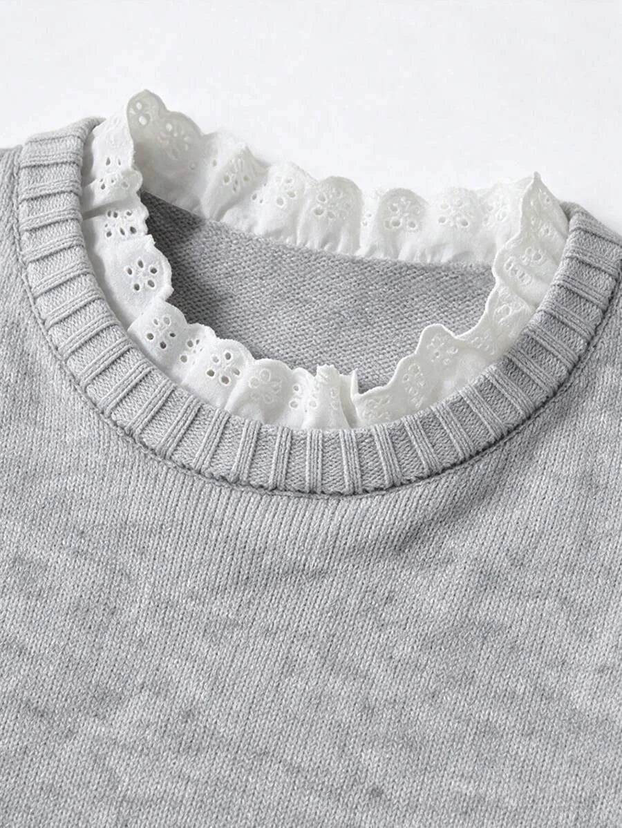 Sweater met kant en ronde hals