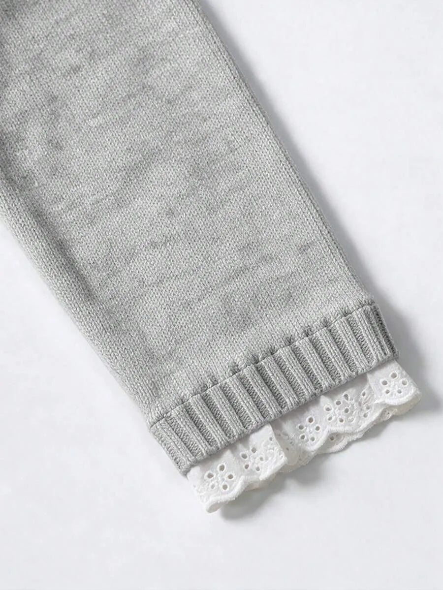 Sweater met kant en ronde hals