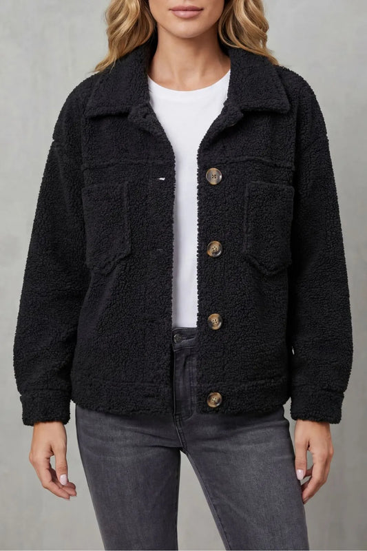 Fleece jas met knopen en zakken