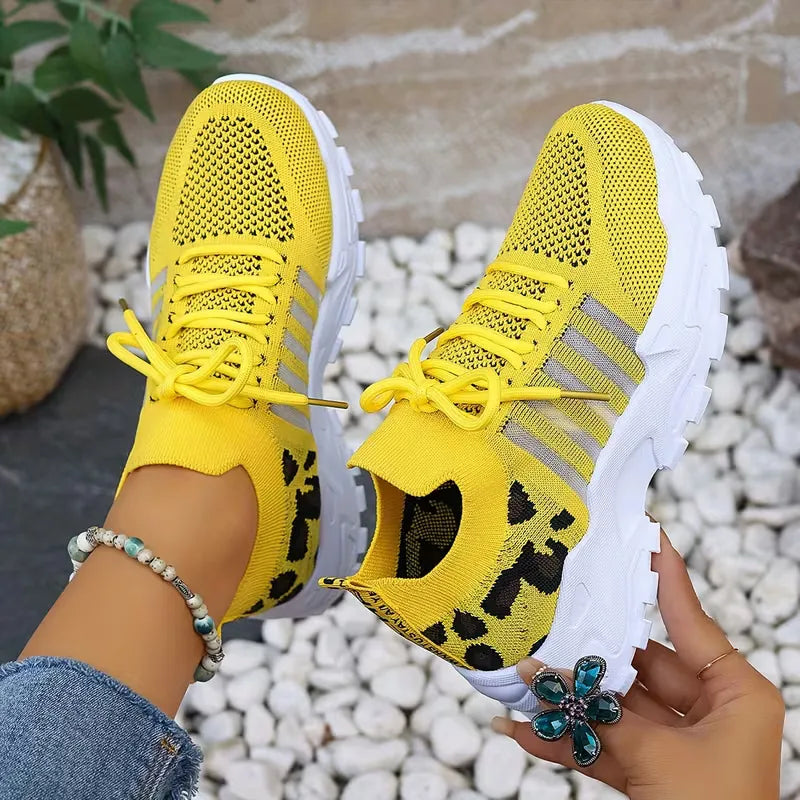 Lage sneaker met leopard print