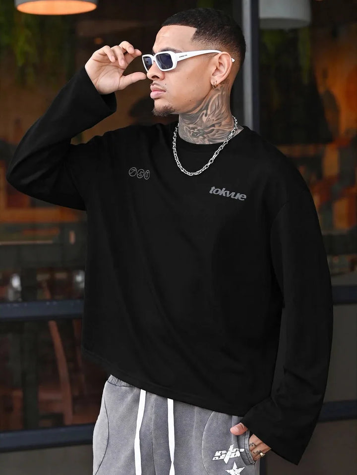 Oversized longsleeve met graphic slogan