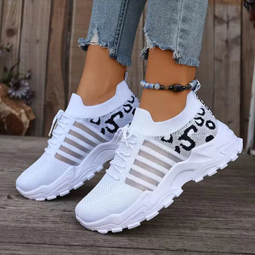 Lage sneaker met leopard print