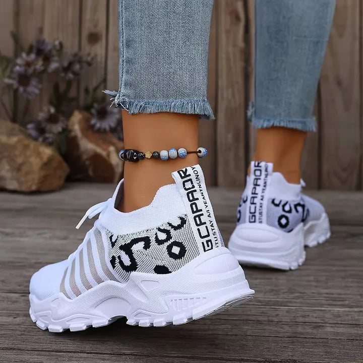 Lage sneaker met leopard print