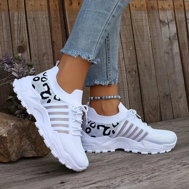 Lage sneaker met leopard print