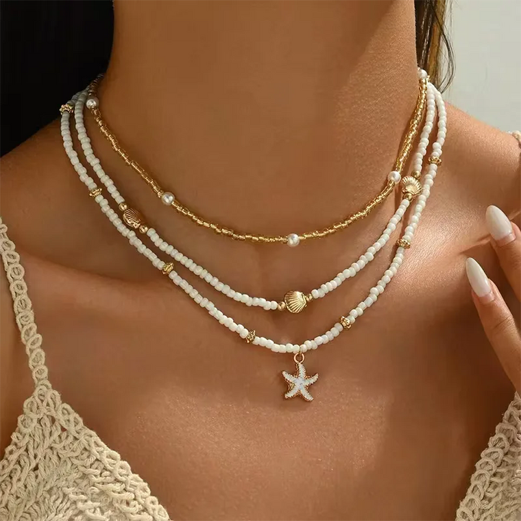 Ketting met schelp en ster