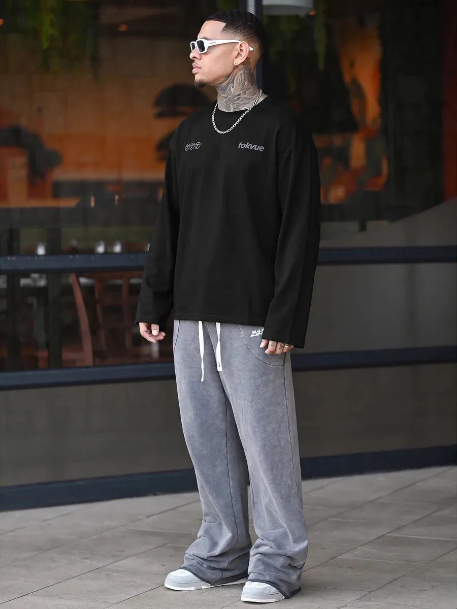 Oversized longsleeve met graphic slogan