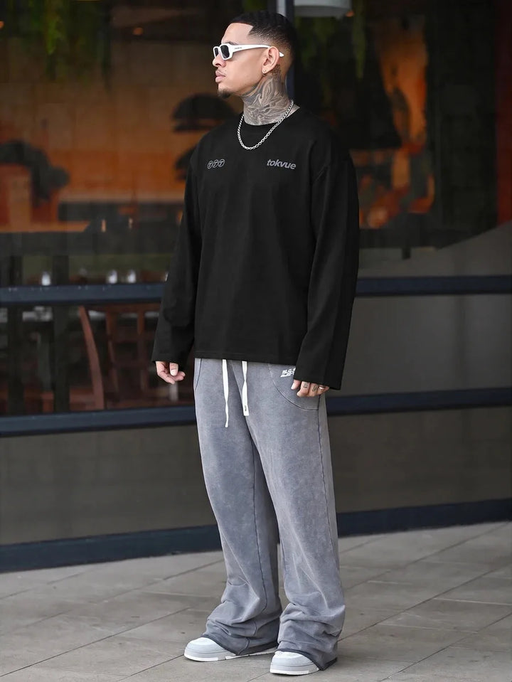 Oversized longsleeve met graphic slogan