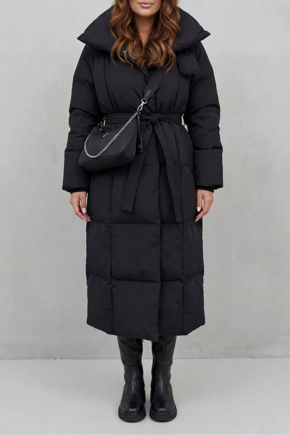Lange puffer jas met ceintuur