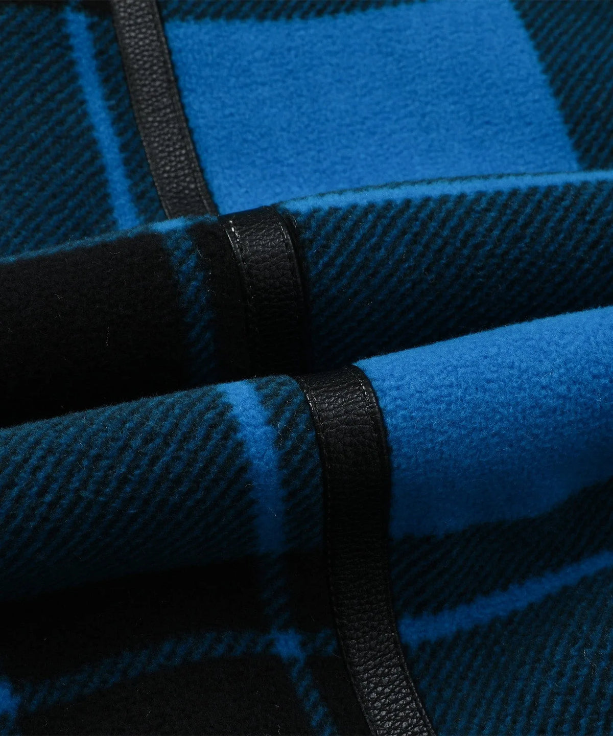 Bomberjack met plaid en faux shearling