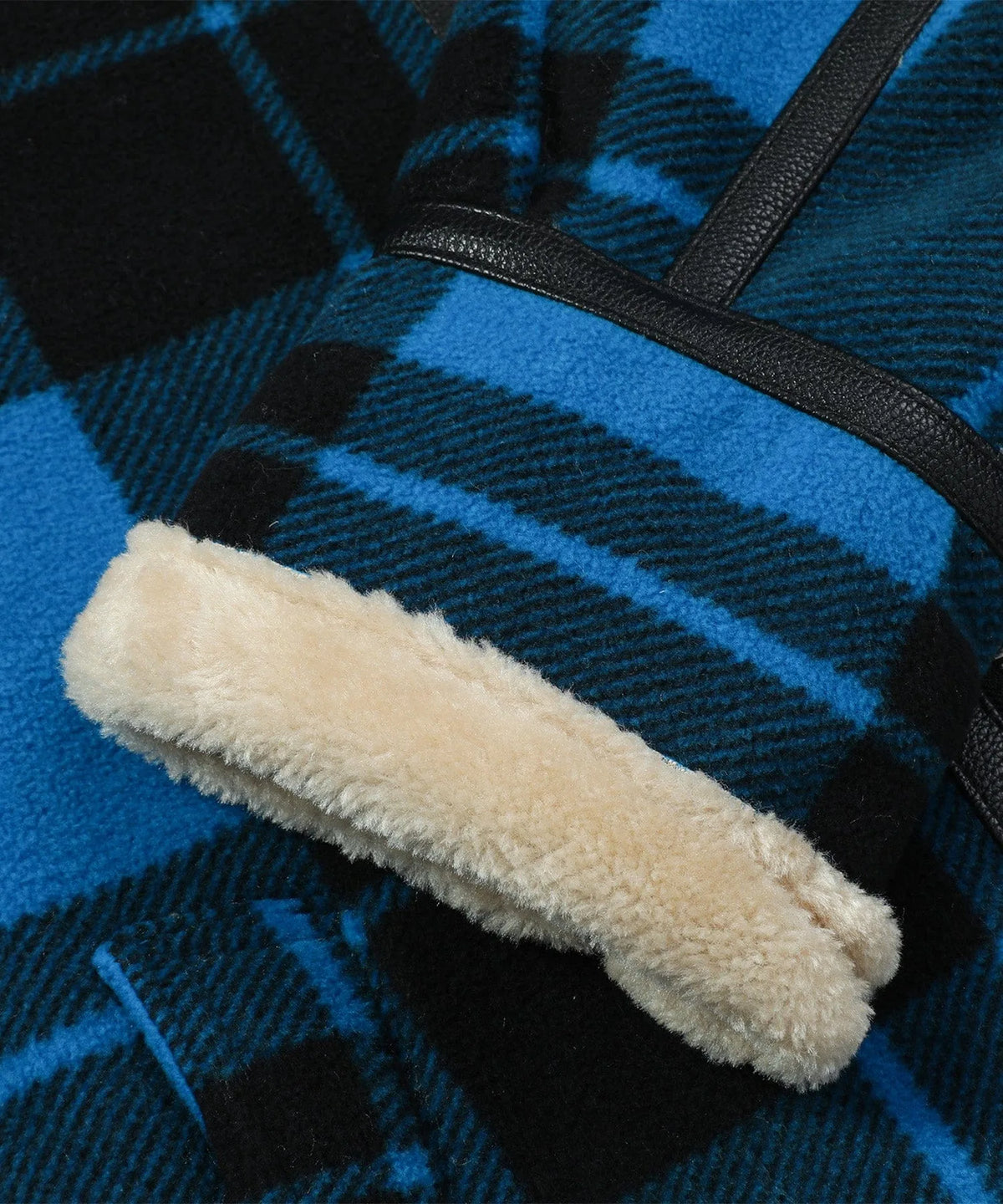 Bomberjack met plaid en faux shearling