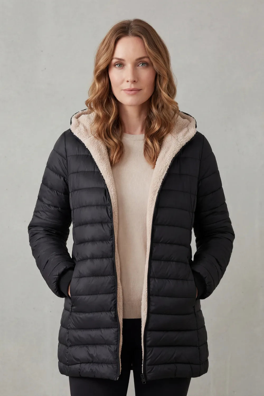 Zwarte puffer jas met capuchon