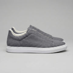 Slip-on sneakers met suède