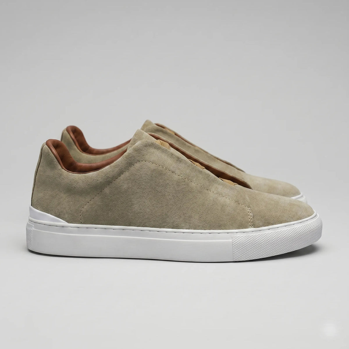 Slip-on sneakers met suède
