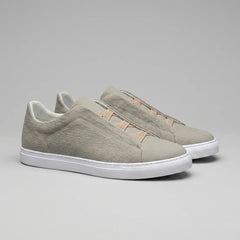 Slip-on sneakers met suède