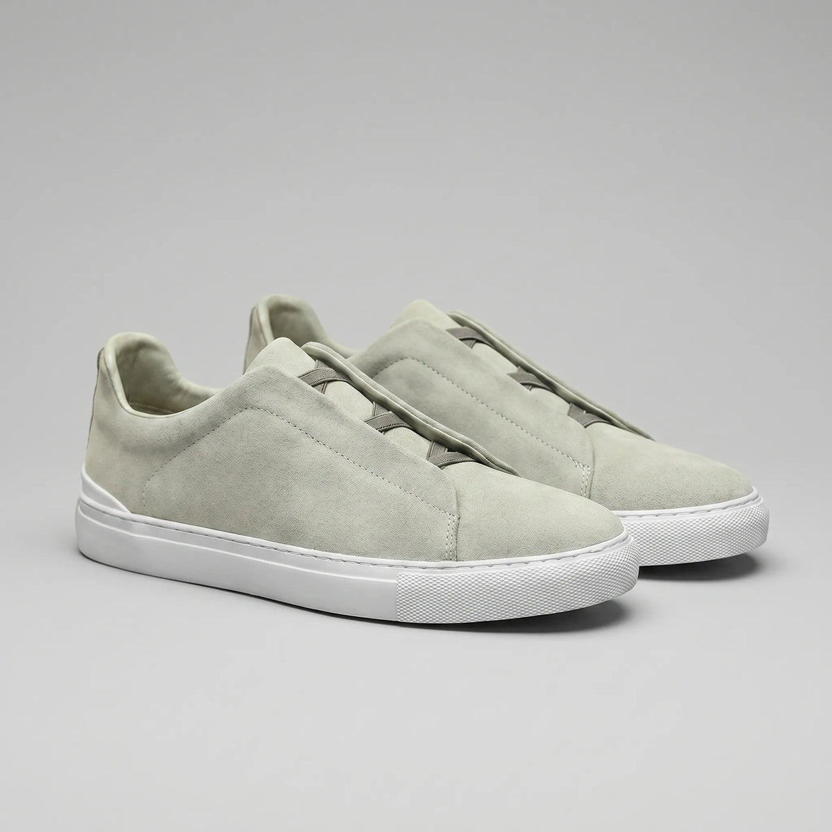 Slip-on sneakers met suède