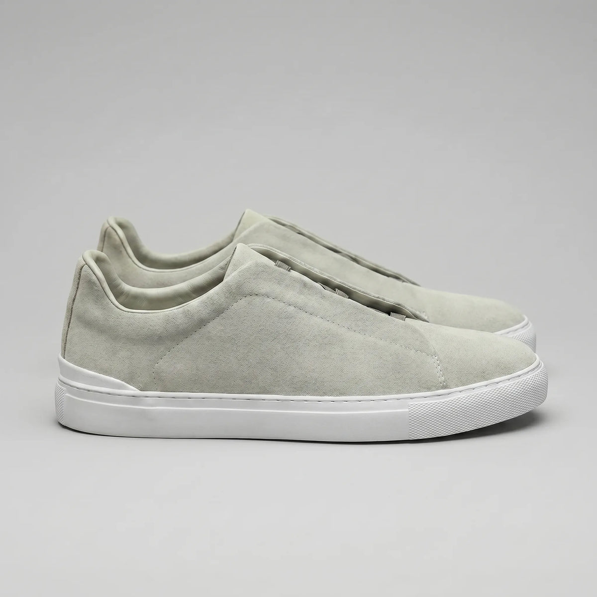 Slip-on sneakers met suède