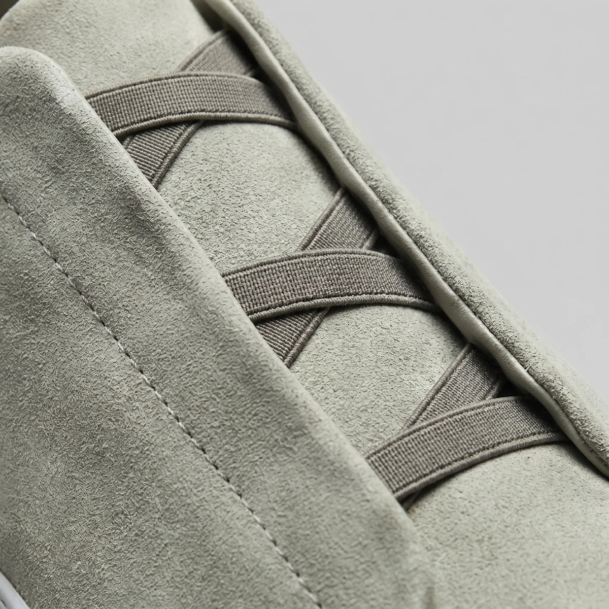 Slip-on sneakers met suède