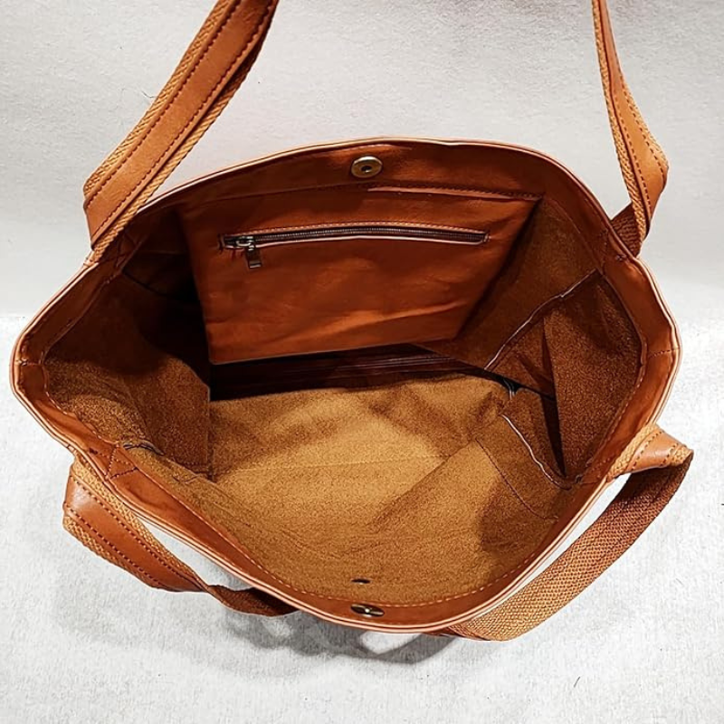 Leren tas met vlekbestendig interieur en binnenvak met rits