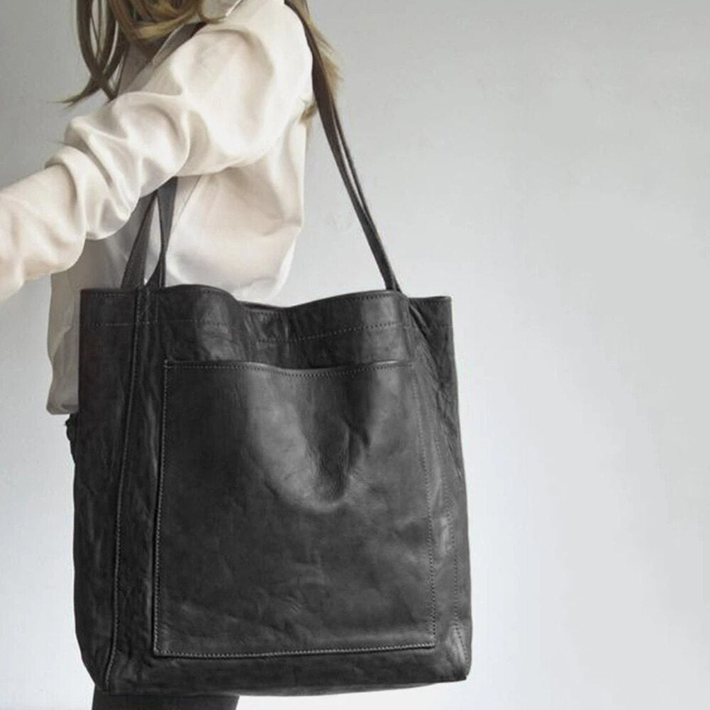 Leren tas met vlekbestendig interieur en binnenvak met rits