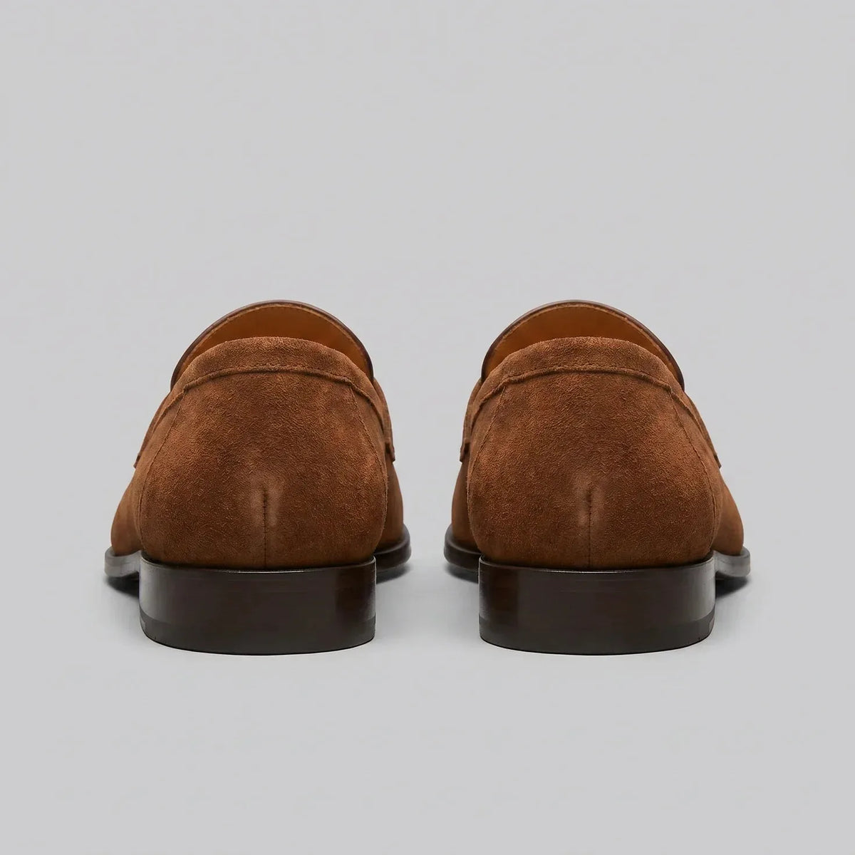 Bruine penny loafers met suède look