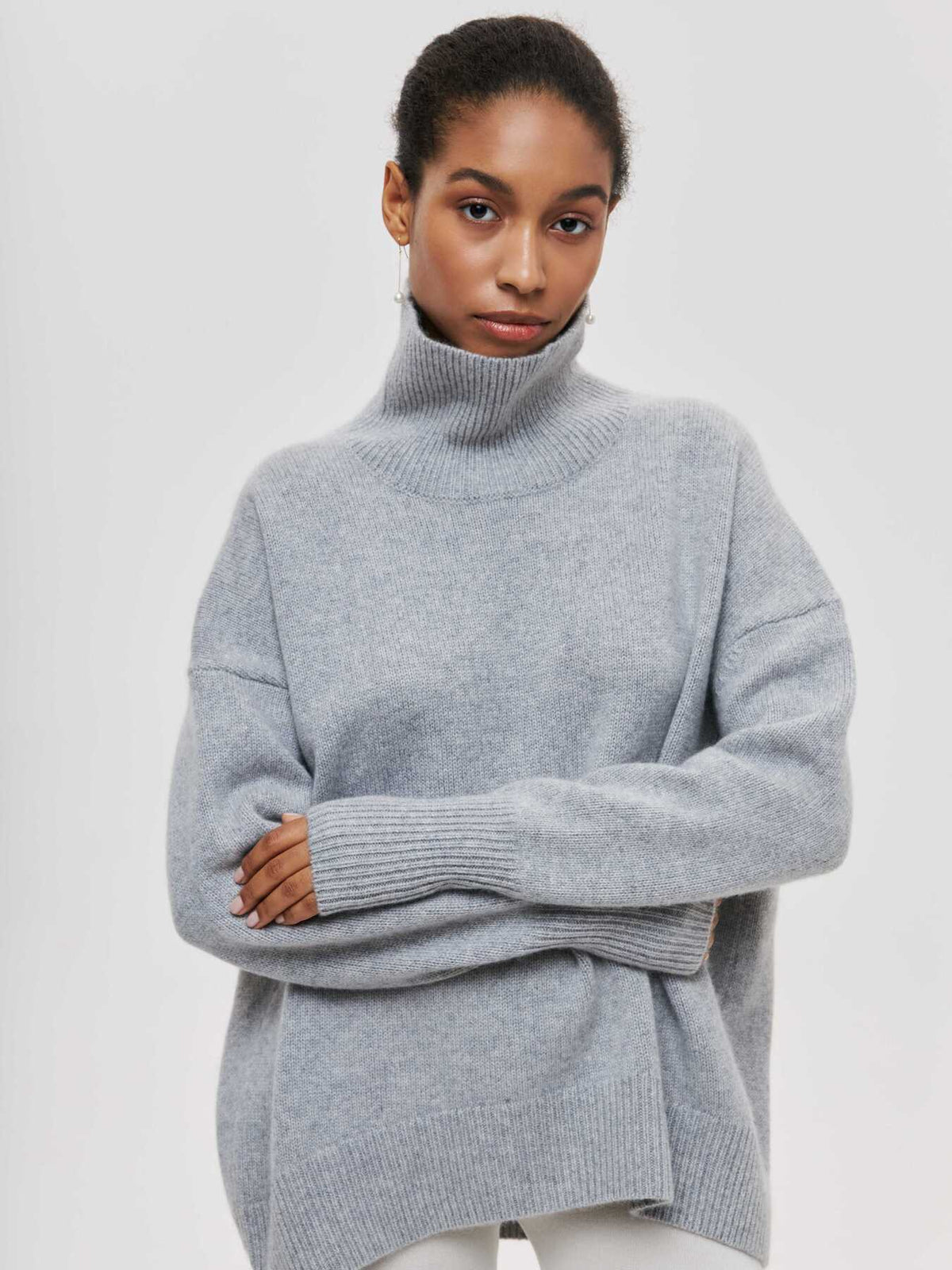 Oversized trui met hoge col en ribgebreide afwerking