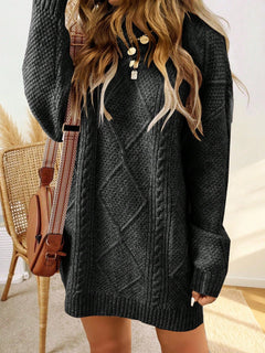 Trui jurk met kabelpatroon en ribbelafwerking