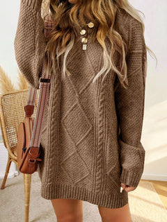 Trui jurk met kabelpatroon en ribbelafwerking