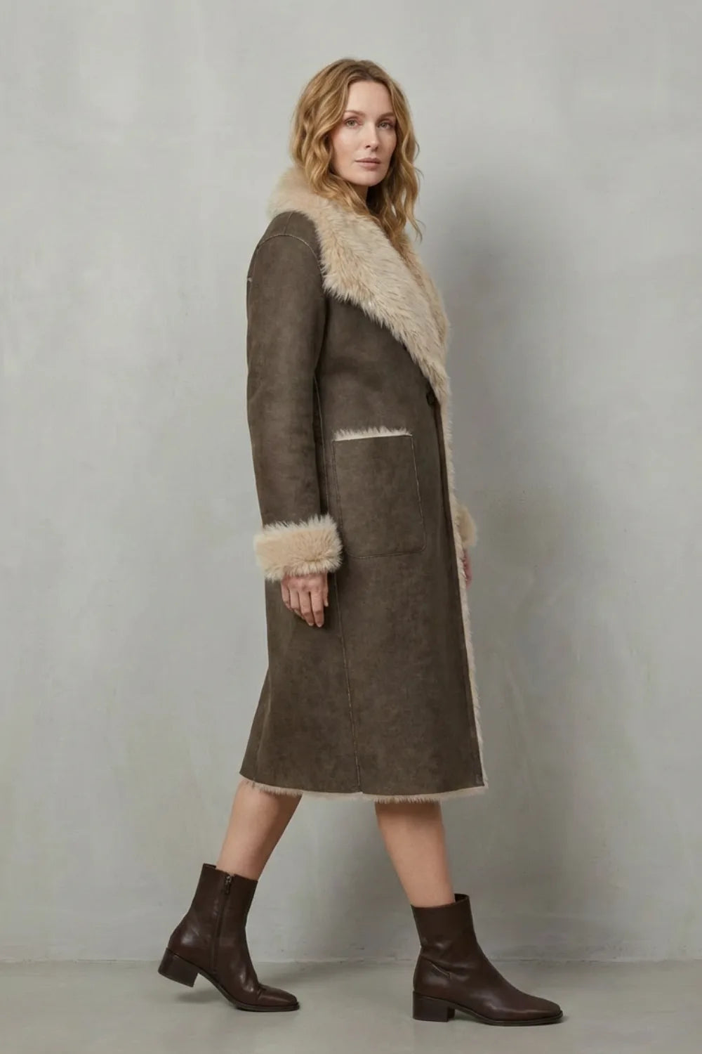 Omkeerbare faux shearling jas