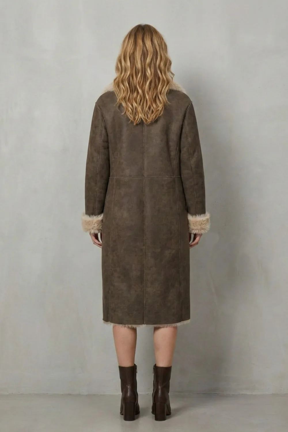 Omkeerbare faux shearling jas