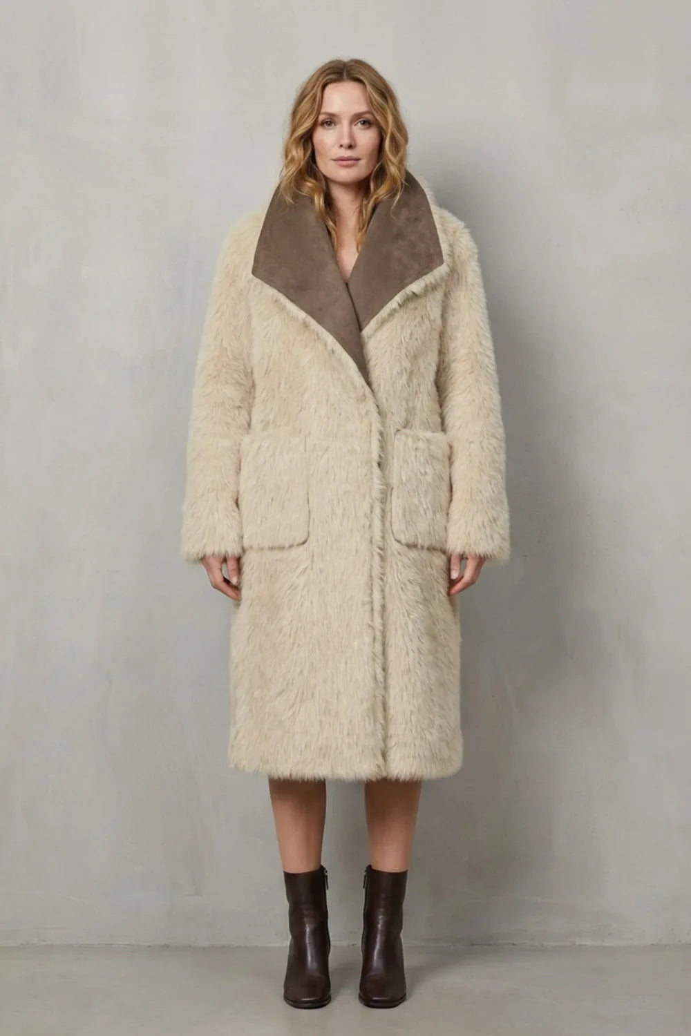 Omkeerbare faux shearling jas