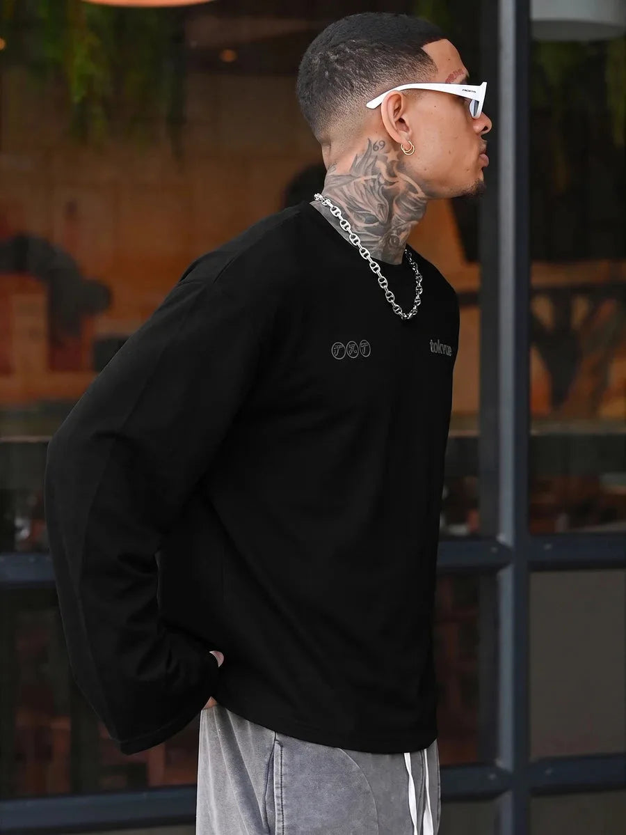 Oversized longsleeve met graphic slogan
