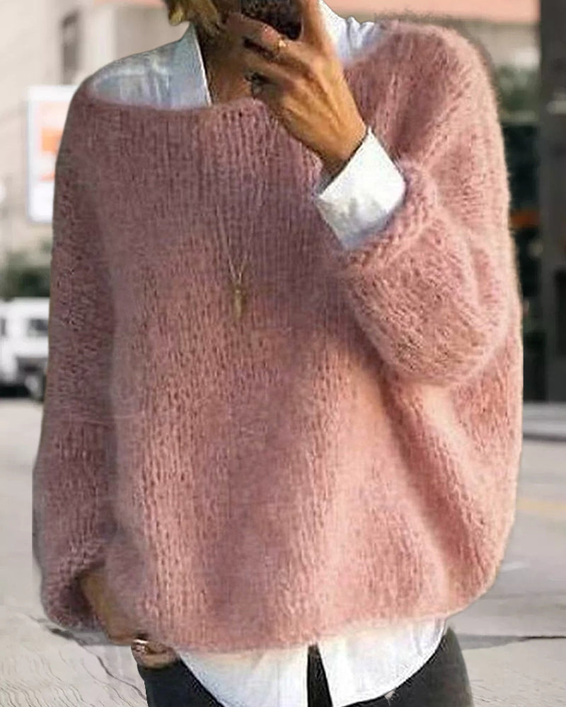 Danique Mell | Effen offshoulder pluizige trui in de kleur Roze voor dames in stijl ideaal voor de herfst.