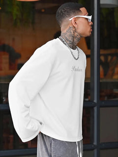 Oversized longsleeve met graphic slogan