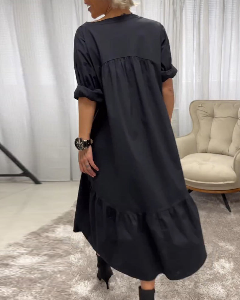 Jurk met 3/4 mouwen en diepe V-hals in de kleur Zwart voor dames in stijl ideaal voor de herfst.