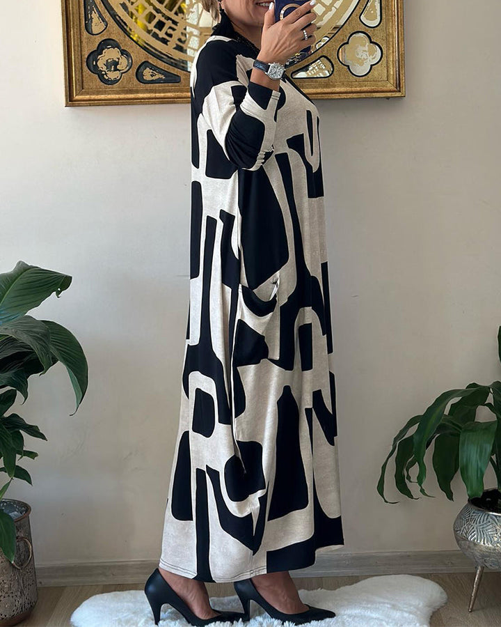 Jurk met lange mouwen en zwart witte print in de kleur Zwart voor dames in stijl ideaal voor de herfst.
