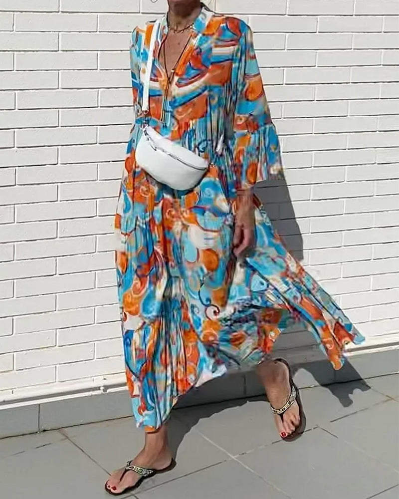 Jurk met vlotte print en V-hals in de kleur Blauw voor dames in stijl ideaal voor de lente.