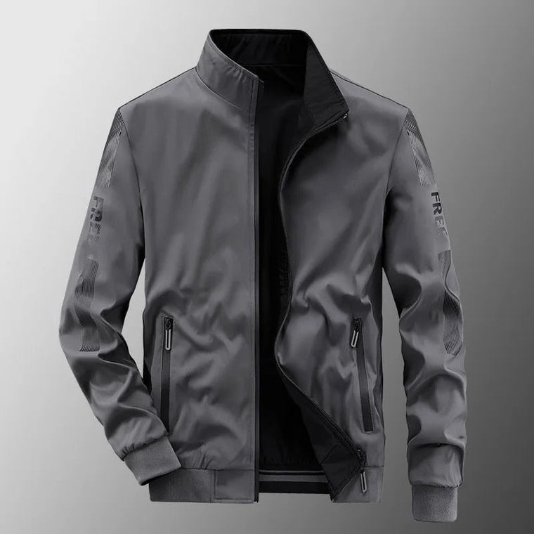 Lars | Omkeerbare waterdichte heren zomerjas in de kleur Grijs voor heren in Outdoor stijl ideaal voor de lente.