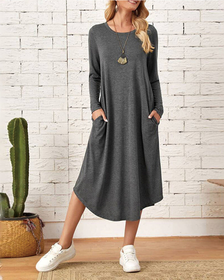 Milleke | Damesjurk met lange mouwen in de kleur Grijs voor dames in stijl ideaal voor de lente.