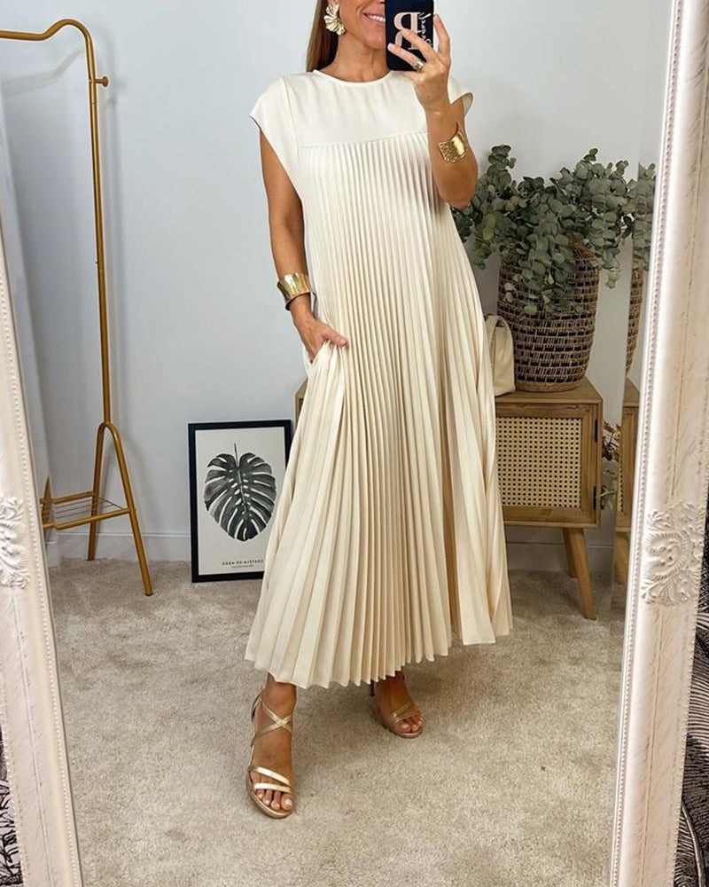 Mouwloze geplooide eenvoudige effen kleur jurk in de kleur Beige voor dames in stijl ideaal voor de herfst.