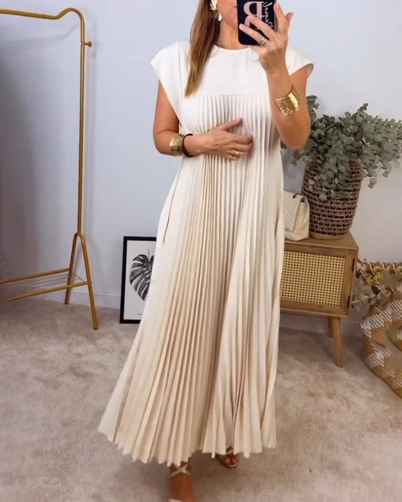 Mouwloze geplooide eenvoudige effen kleur jurk in de kleur Beige voor dames in stijl ideaal voor de herfst.