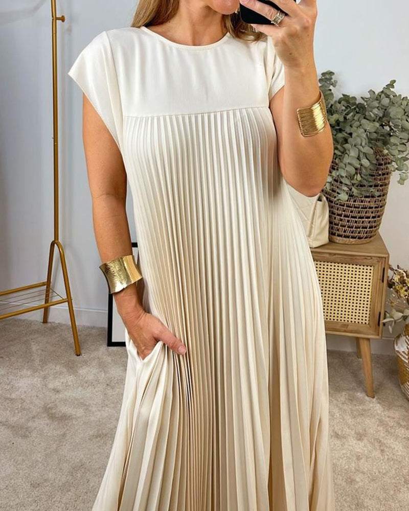 Mouwloze geplooide eenvoudige effen kleur jurk in de kleur Beige voor dames in stijl ideaal voor de herfst.