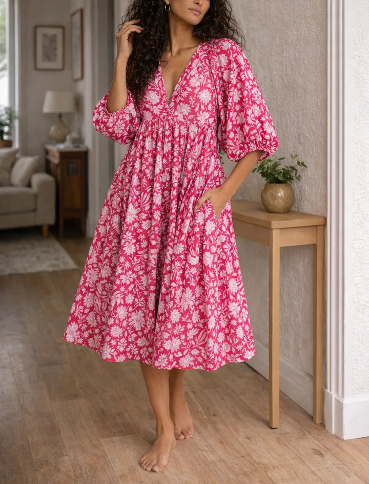Jurk met bloemen en V-hals