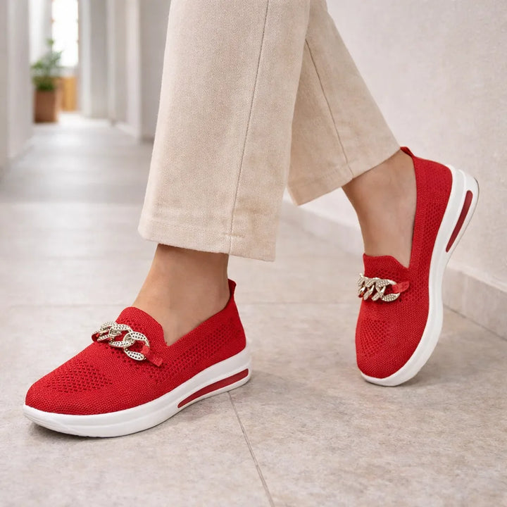 Slip-on sneakers met ketting