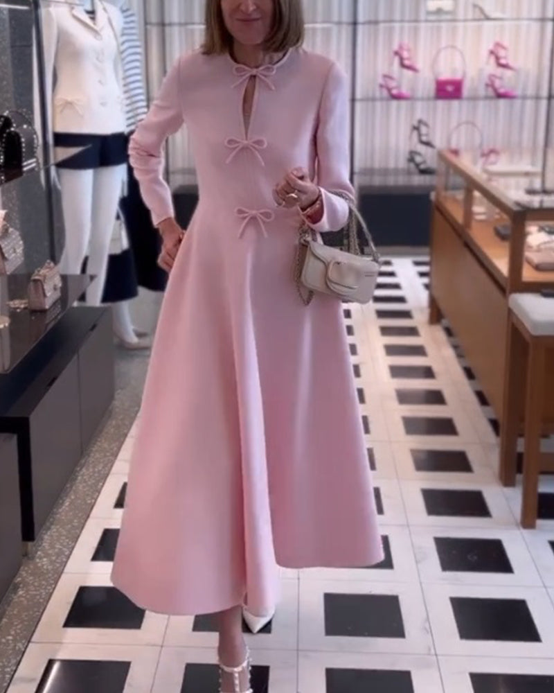 Arial | Effen kleur elegante jurk met strikken in de kleur Roze voor dames in stijl ideaal voor de herfst.