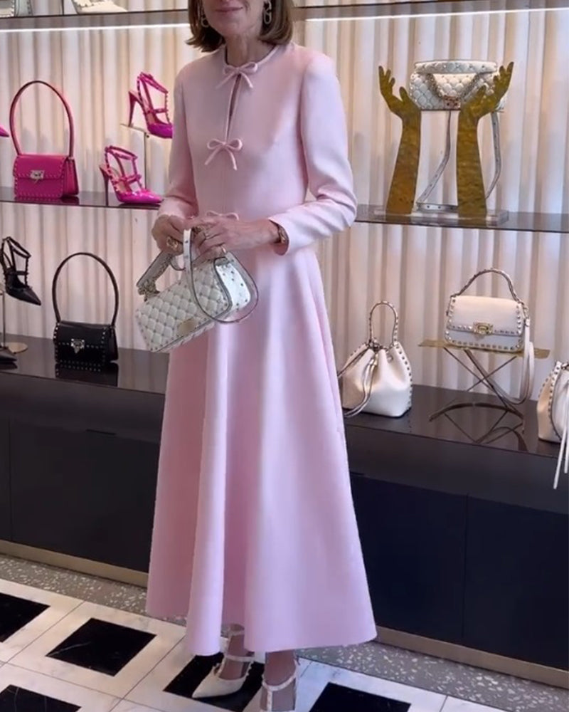 Arial | Effen kleur elegante jurk met strikken in de kleur Roze voor dames in stijl ideaal voor de herfst.
