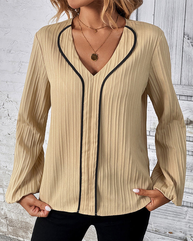 Elegante top met lange mouwen in de kleur Goud voor dames in stijl ideaal voor de herfst.